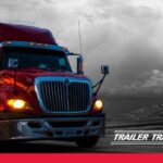 Trailer Transit Inc. logo on photo of red truck hauling on the road