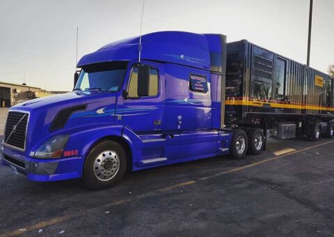 why-hire-us2 Trailer Transit Inc. blue truck with black trailer