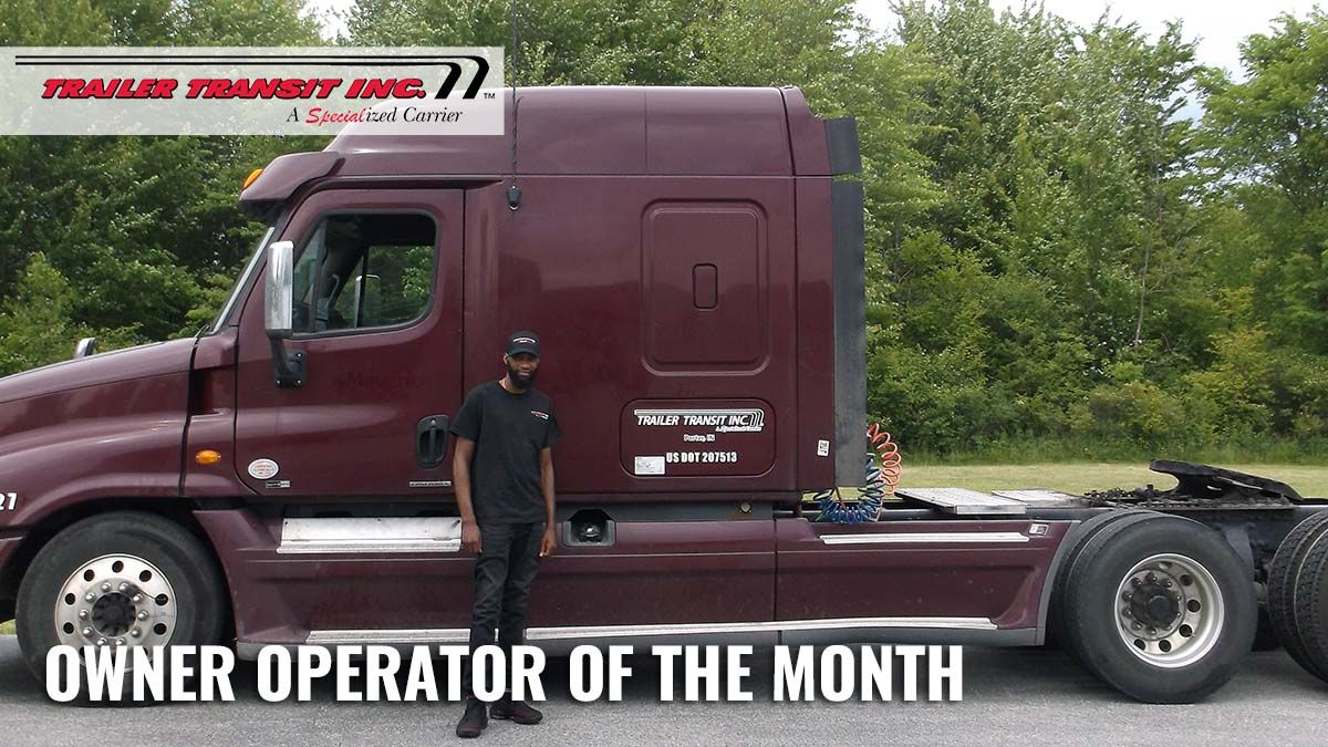 Trailer Transit Inc. | A man standing in front of a truck with the text owner operator of the month.