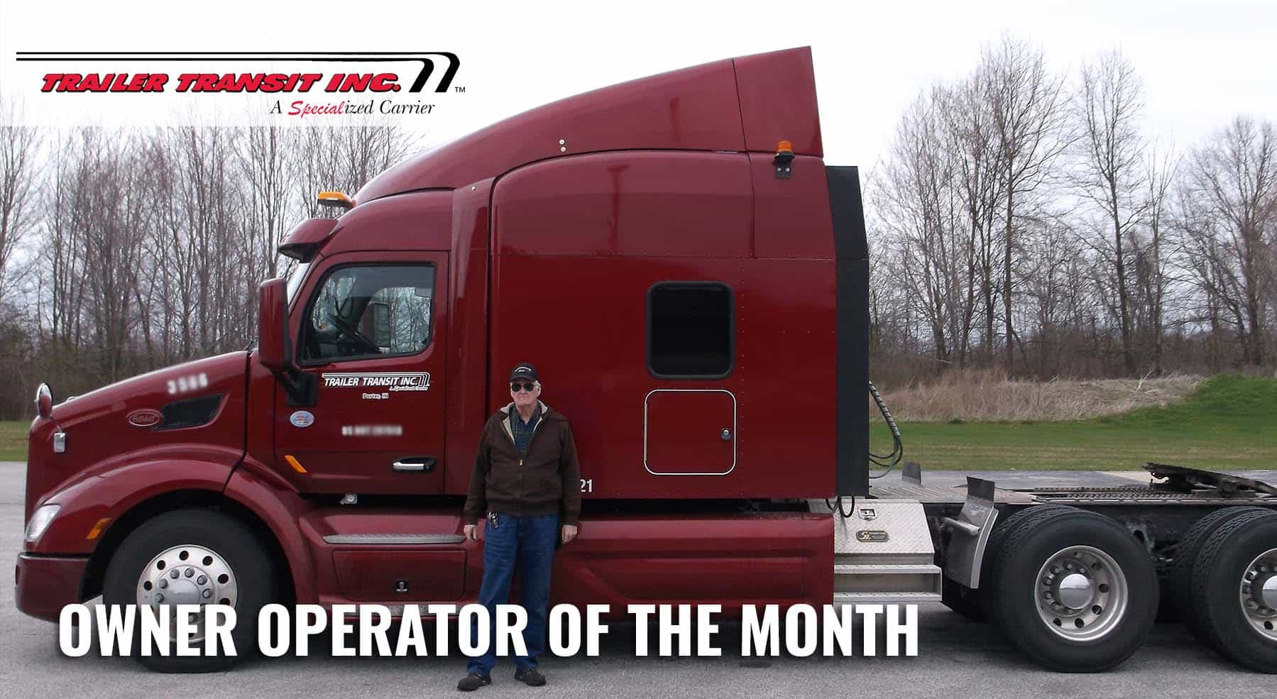 Trailer Transit Inc. | A man standing in front of a truck with the words owner operator of the month.