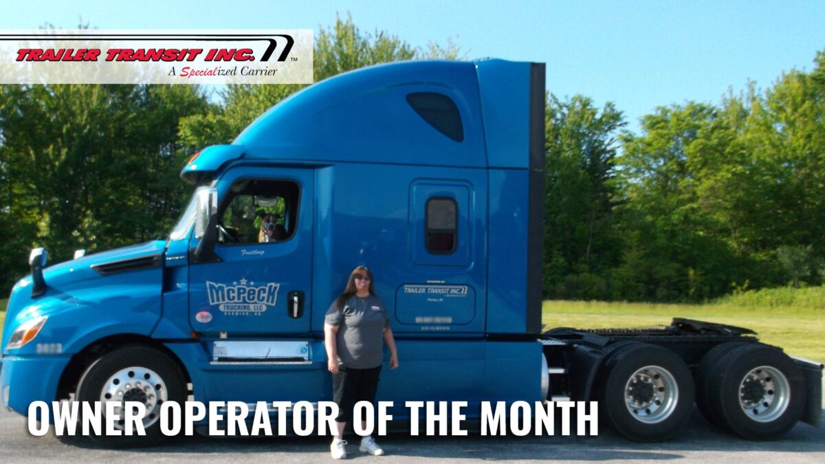 June 2021 Owner Operator of the Month at Trailer Transit, Inc standing in front of her truck