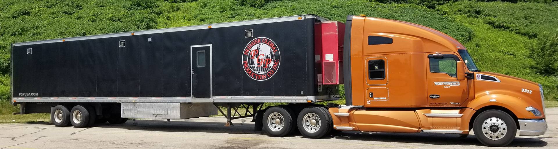 pgp Trailer Transit Inc. | The best owner operator company showcases a semi truck with a trailer parked in front of it.