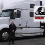 Trailer Transit Inc. | An owner operator standing in front of a white semi truck.