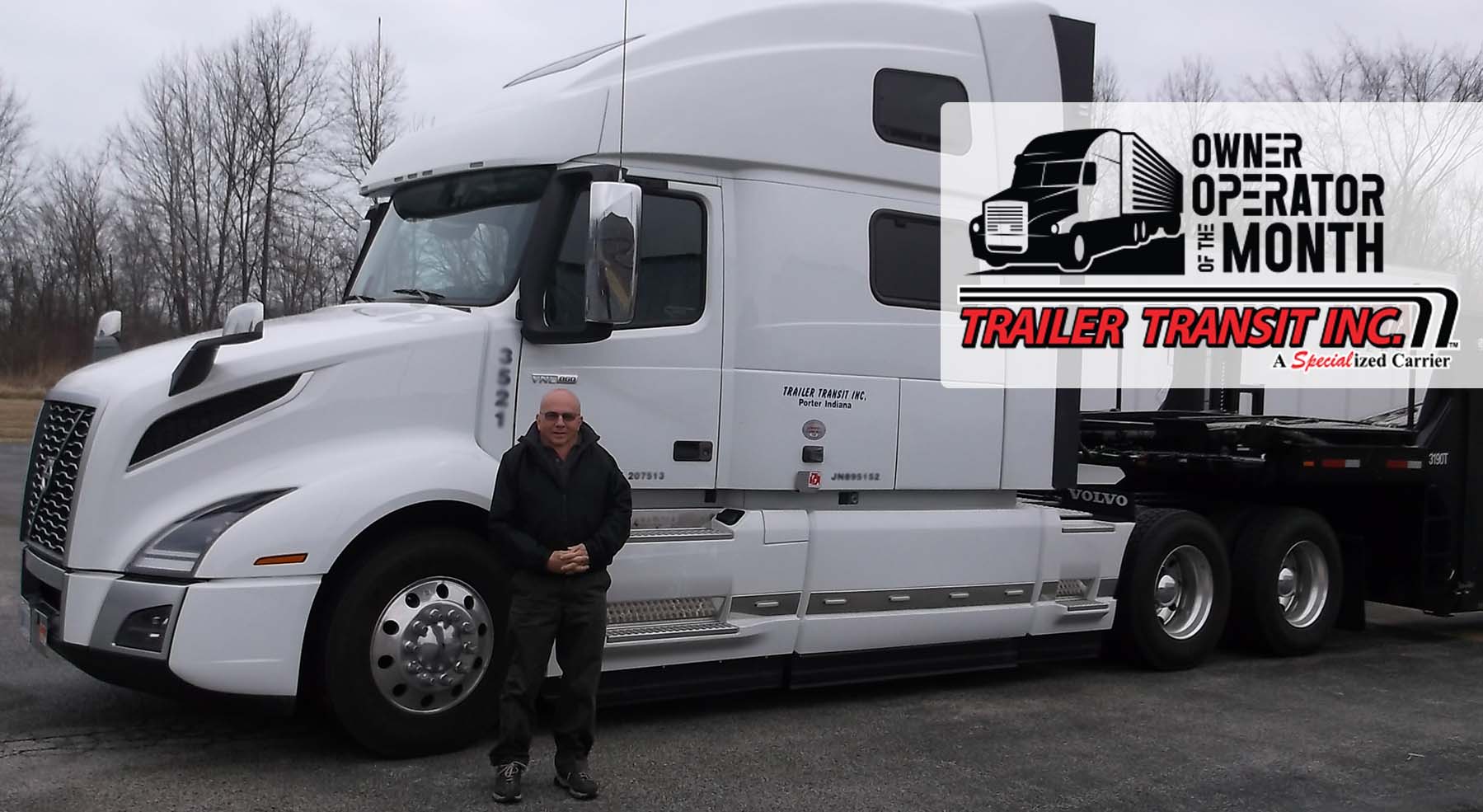 Trailer Transit Inc. | An owner operator standing in front of a white semi truck.