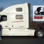 Trailer Transit Inc. | A man standing in front of a semi truck.