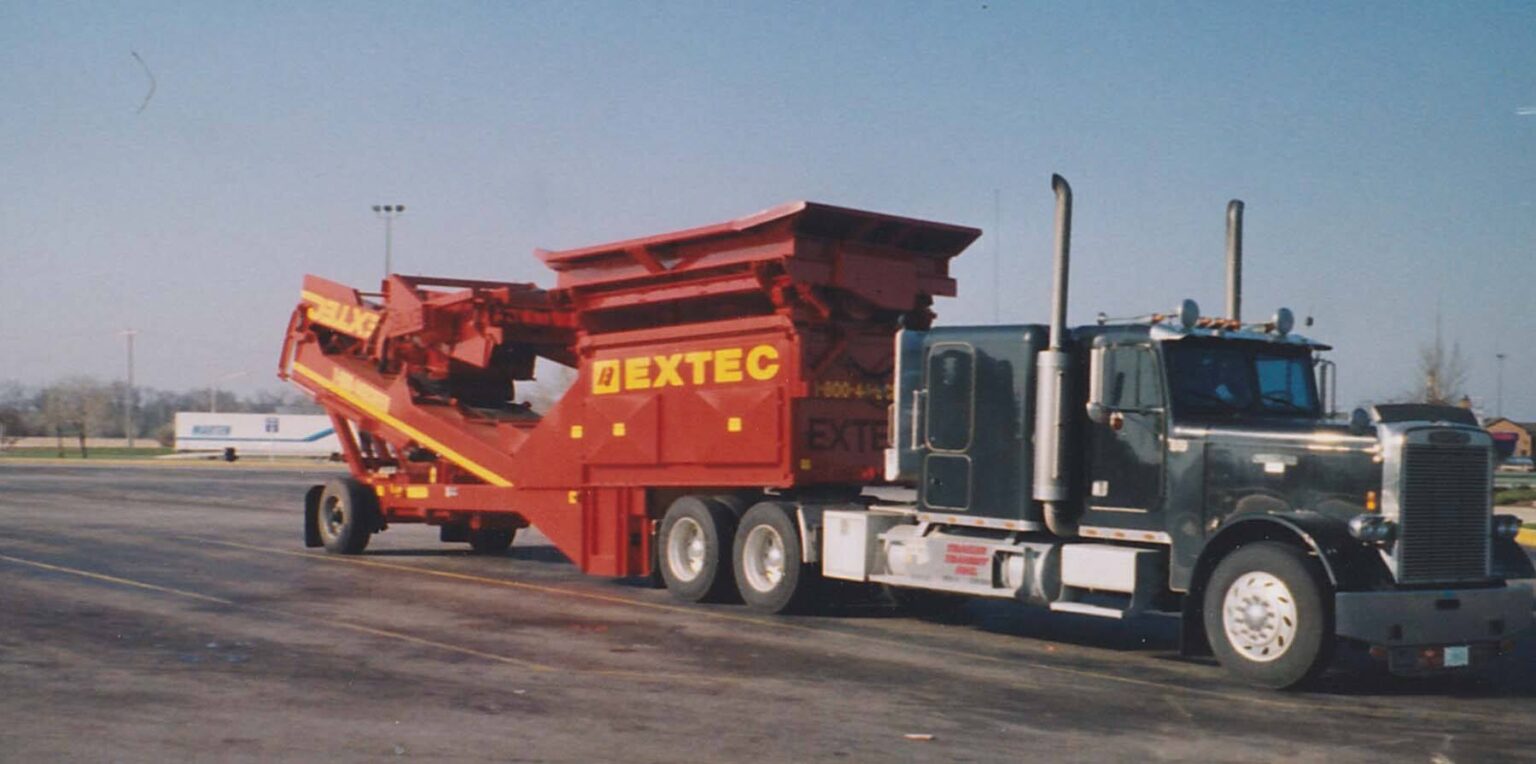 Trailer Transit, Inc truck hauling industrial equipment