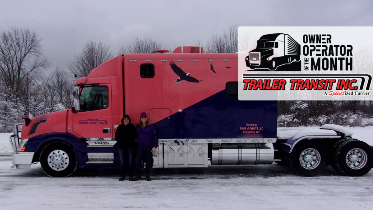 Trailer Transit Inc. | Two women standing in front of a pink and purple semi truck.