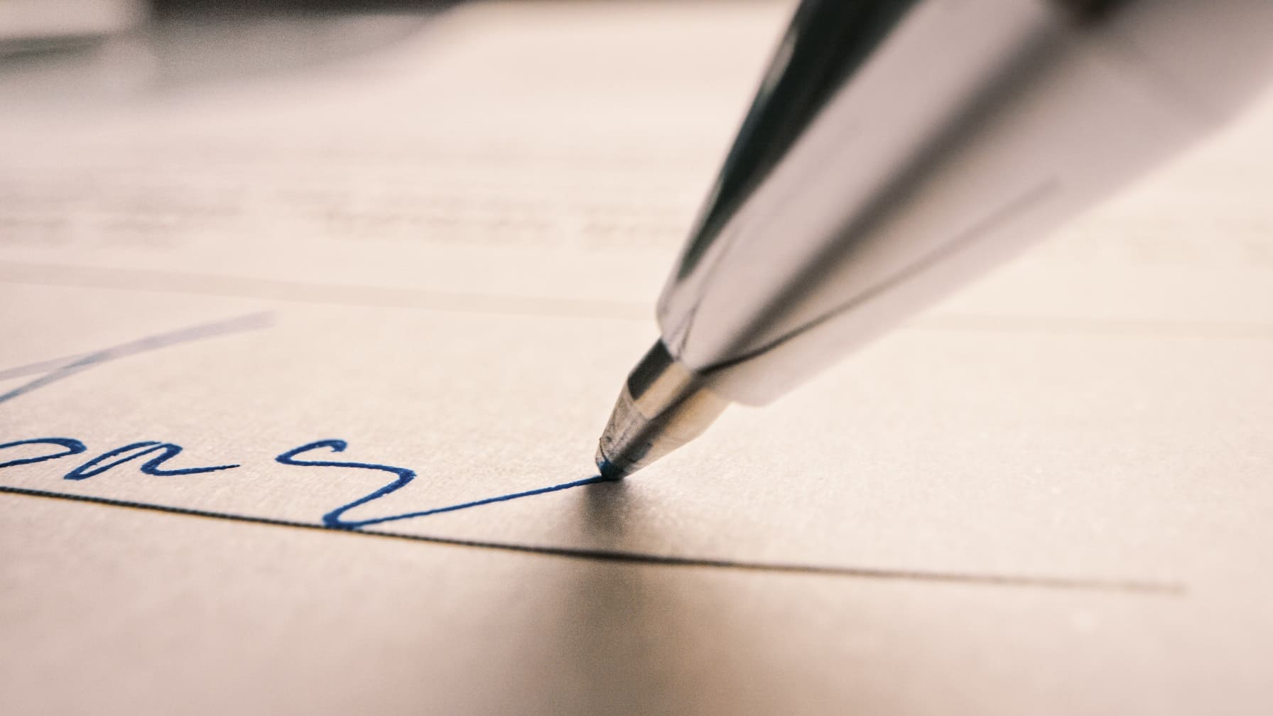 Person Signing Important Document. Camera Following Tip of the P pen signing name on contract
