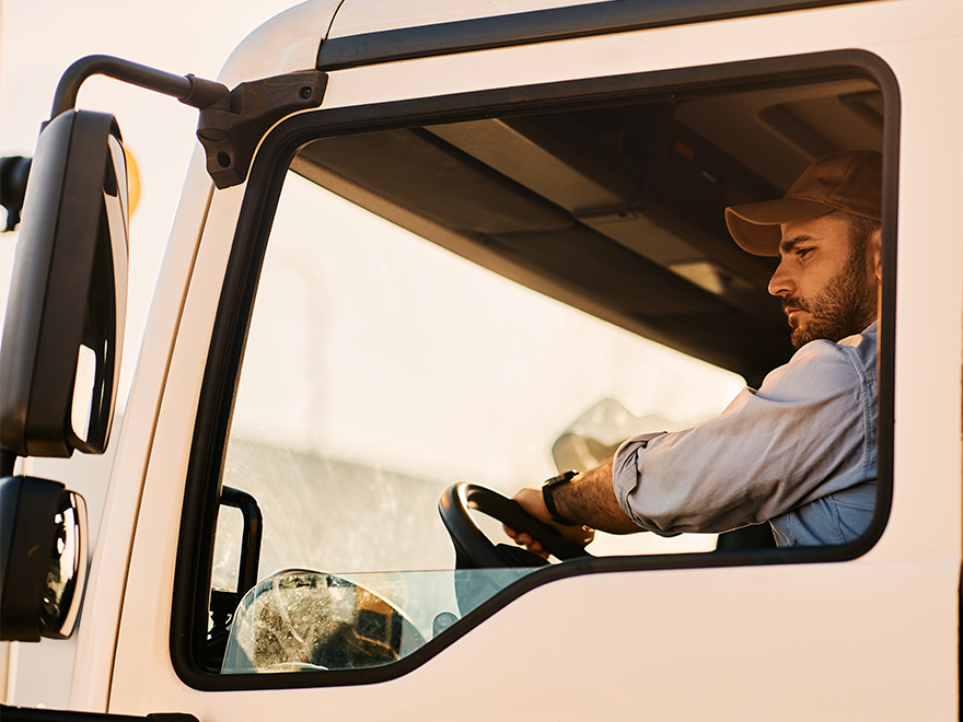 truck driver in cab looking out the window