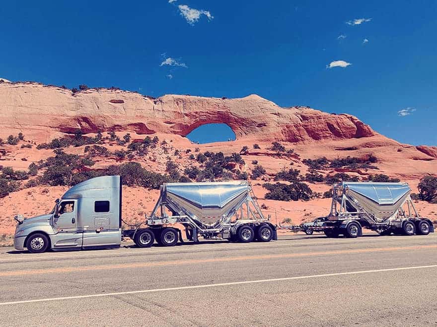 Trailer Transit Inc. | Owner Operator hauling Dry Bulk Pneumatic Trailers parked on the side of the road.