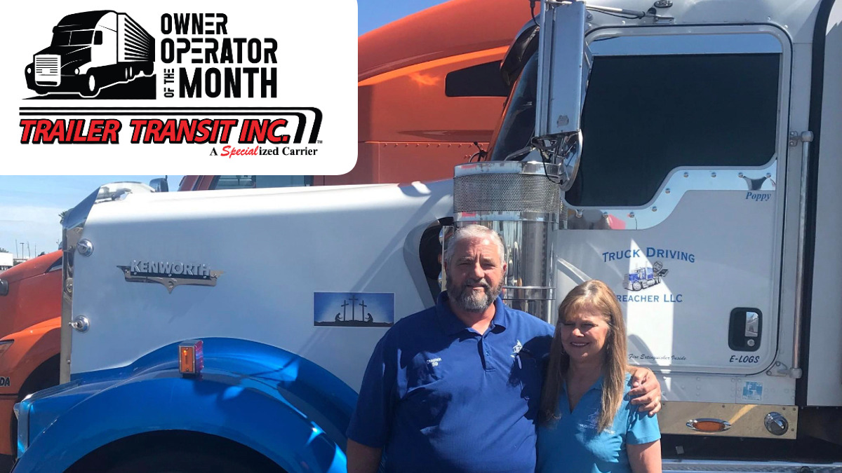 Trailer Transit Inc. | August Owner Operator of the Month - Bill & his wife standing in front of their rig.