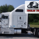 Trailer Transit Inc. | An Owner Operator standing in front of a white semi truck.