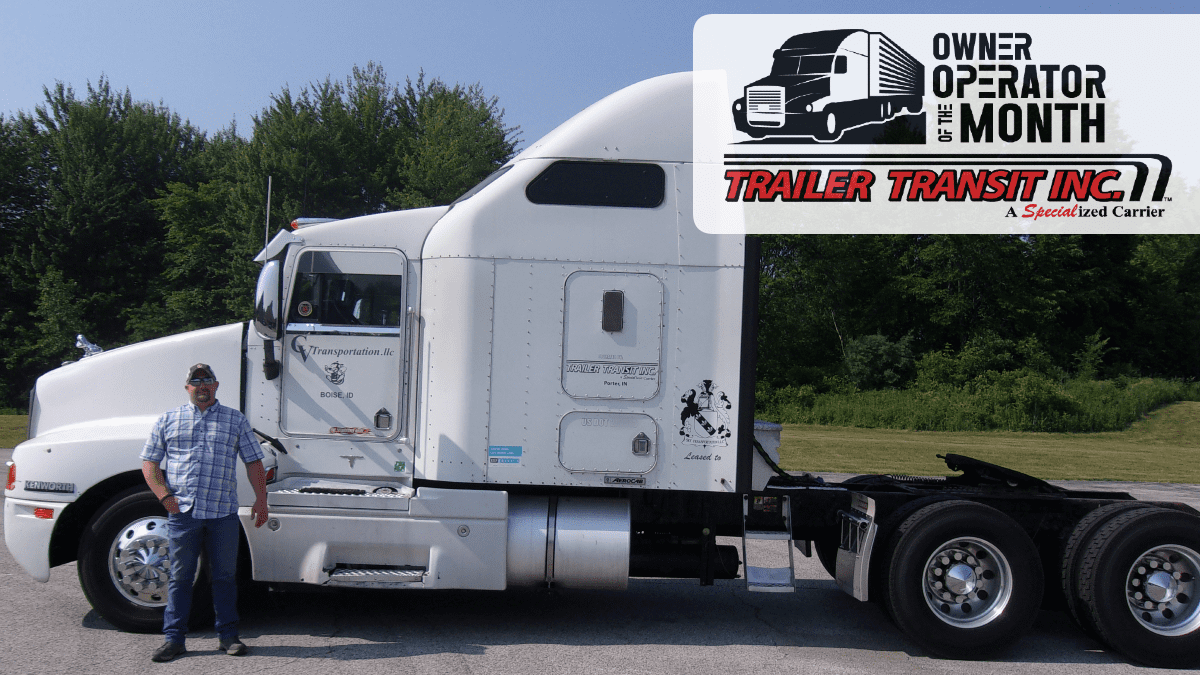 Trailer Transit Inc. | An Owner Operator standing in front of a white semi truck.