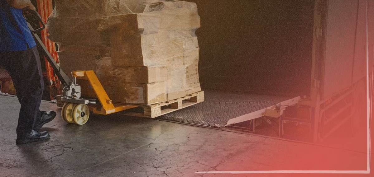 TT in-blog images - 0825 Blog-1 Trailer Transit Inc. | A pallet is being loaded onto a truck via a ramp.