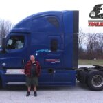 Trailer Transit Inc. | Owner Operator of the Month, Richard, stands in front of his blue semi-truck with "Trailer Transit Inc." branding, representing Power Only trucking in Indiana.