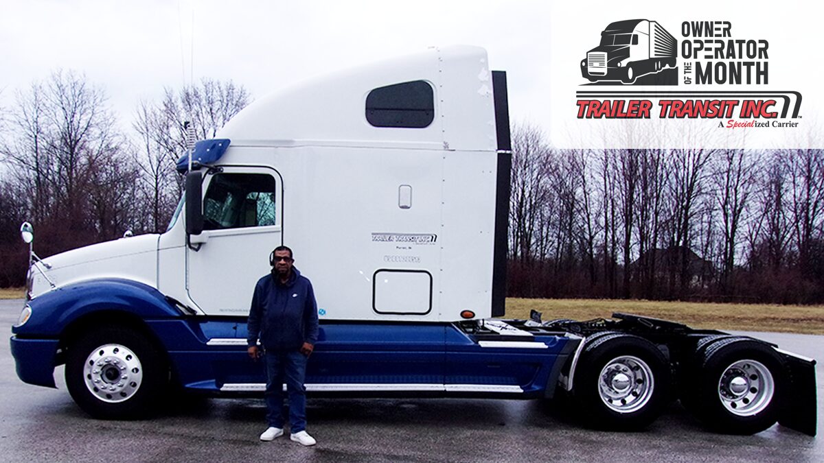Trailer Transit Inc. | Owner Operator, Nathaniel, stands in front of his blue and white semi-truck, representing Owner Operator trucking in Indiana. The image features "Owner Operator of the Month" and "Trailer Transit Inc." logos in the corner.