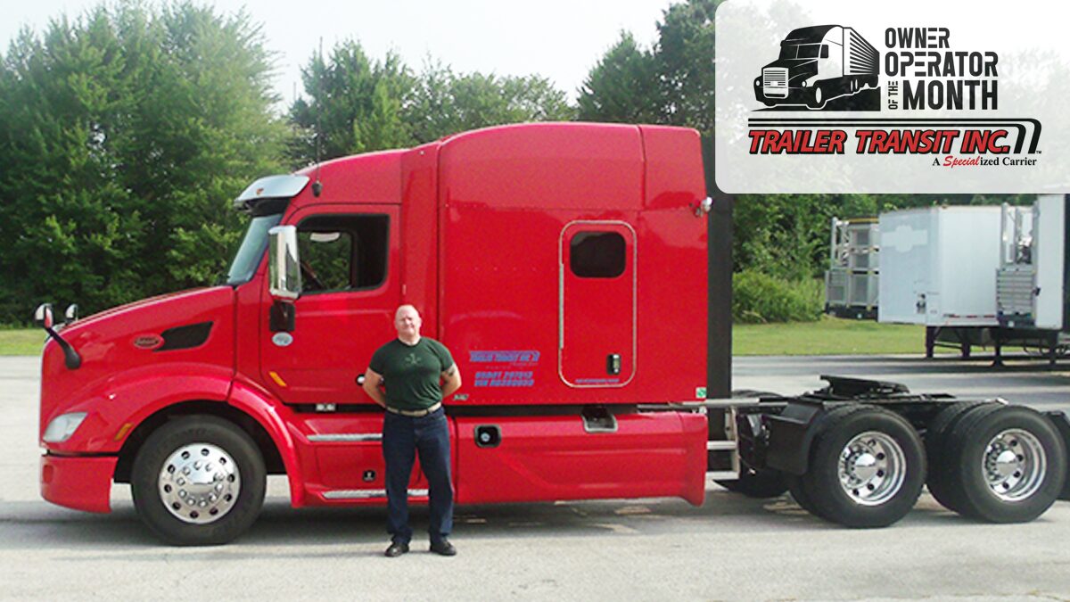 Trailer Transit Inc. | Owner Operator, Scott, stands in front of his red semi-truck, representing Owner Operator trucking in Indiana, with "Owner Operator of the Month" and "Trailer Transit Inc." logos in the top right corner.
