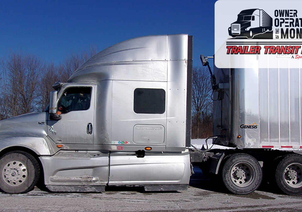 Trailer Transit, Inc. | Owner Operator, Nancy, sits in her silver semi-truck parked on pavement in winter. An overlay in the top right corner reads “Owner Operator of the Month, Trailer Transit Inc.” with a truck icon and logo.