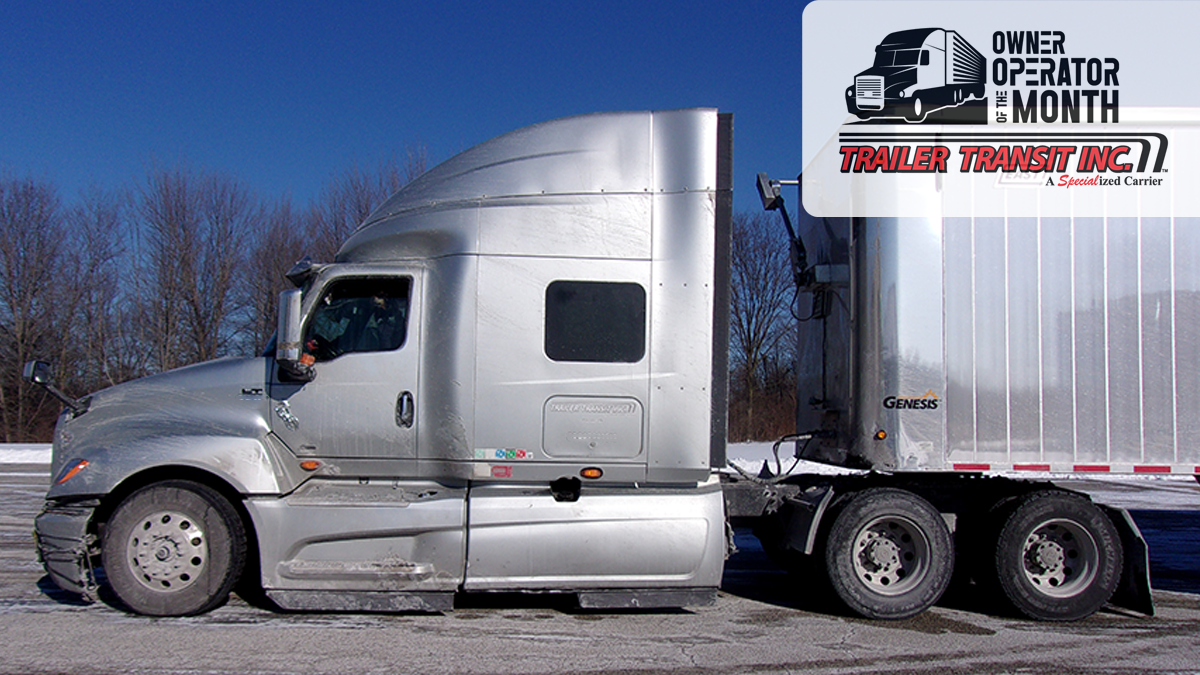 Trailer Transit, Inc. | Owner Operator, Nancy, sits in her silver semi-truck parked on pavement in winter. An overlay in the top right corner reads “Owner Operator of the Month, Trailer Transit Inc.” with a truck icon and logo.